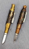 Two vintage style pen knives with front gravity ejecting blades. The knives measure approx. 2 1/2
