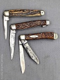Three vintage Remington UMC folding pocket knives for parts or repair. Largest knife measures 4