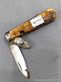 Butcher brand folding knife with what looks like a bleeder. The knife is in good condition with