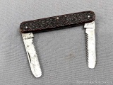 This intriguing pocket knife is 3-1/2