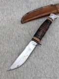 Kabar fixed blade knife with sheath. Measures 8-1/2
