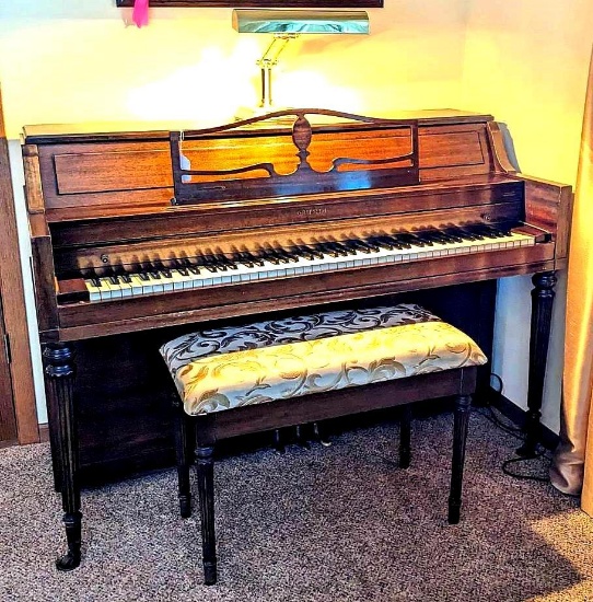 Griffith mid sized piano in nice condition.