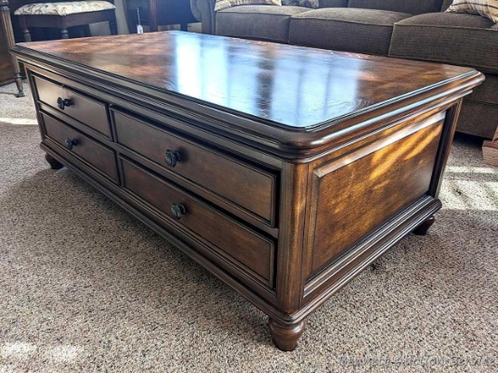 Beautiful coffee table with four drawers and inlay on the top. measures 52" x 28". Great condition.