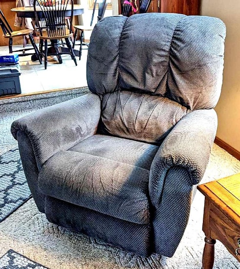 Medium size La Z Boy recliner is in good condition. Rocks and reclines as it should.