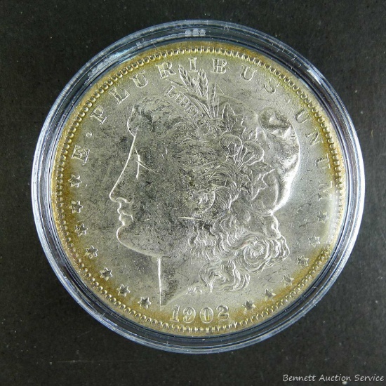 1902-O Morgan silver dollar.