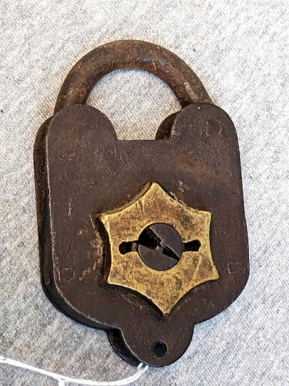 Old padlock is about 3-1/2" tall, no markings found.