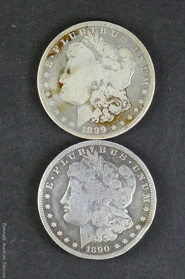 Morgan silver half dollars, 1890-O, 1899-O.