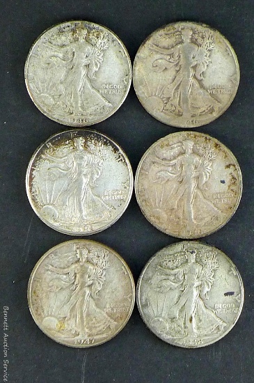 Six Walking Liberty silver half dollars back to 1938.