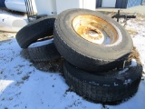 4- 22.5 TRUCK TIRES ON 8 HOLE IMP RIMS