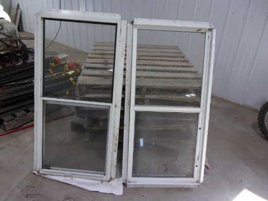 2  22 1/4" X 46 1/2" METAL COMB. WINDOWS