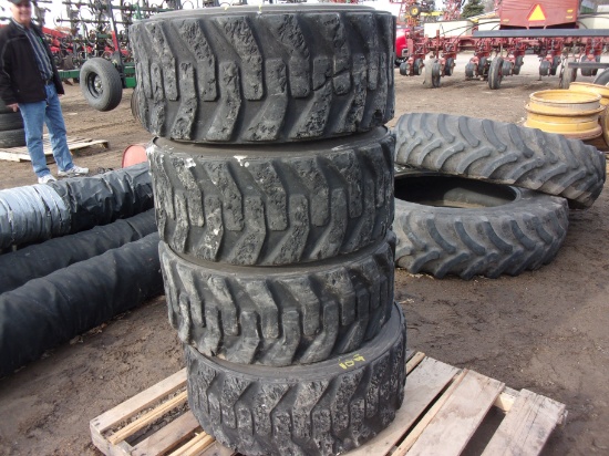 4 - CAT 246  SKID LOADER TIRES ON 8 HOLE RIMS, 12.00 16.5