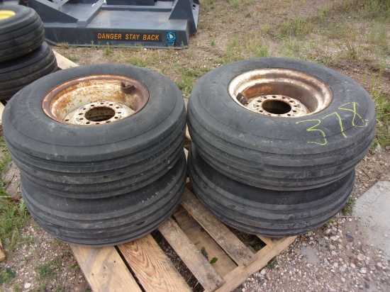 4- 9.5L X 14" IMP. TIRES ON 6 HOLE RIMS