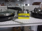 FRYING PANS w/covers, SM. ROASTER, SET OF 3 POTS w/lids, and SETH MCGINN'S CAN COOKER