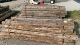 2-BUNDLES OF 25 6' WOOD POSTS