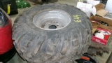 AT 24 X 11.5-10 4 WHEELER TIRE ON RIM