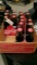 17- UNOPENED COKE BOTTLES IN 6 PACKS w / various sporting events etc. represented on each bottle