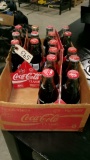 17- UNOPENED COKE BOTTLES IN 6 PACKS w / various sporting events etc. represented on each bottle