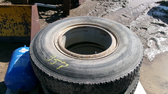 4-10.00 X 20" GRIP TIRES w / rims