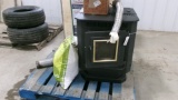 PELLET STOVE w / remote & ONE BAG OF PELLETS, some stove pipe