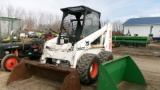 MELROE  843 BOBCAT,  enclosed cab, dirt bucket, ph. Frank @