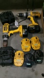 2 DEWALT CORDLESS 14.4 VOLT DRILLS, 7 batteries, 2 chargers