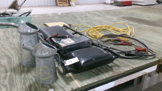 SHOP CREEPER, 2 OIL FILLER JUGS, EXTENSION CORD, BATTERY TESTER,  & JUMPERS,