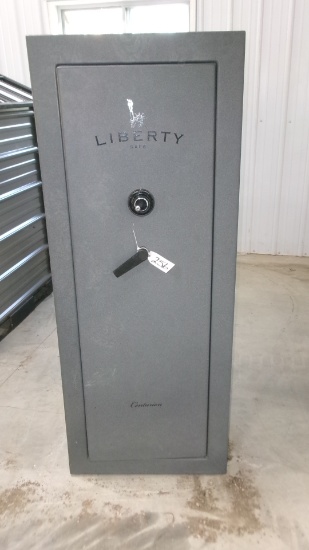 20 GUN LIBERTY GUN SAFE, manual & combination key in office