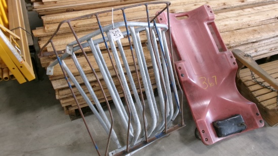 3 TACK UP HAY FEEDERS, CREEPER, 50 # BAGS OF DEICER, & SANDS BLASTING SAND