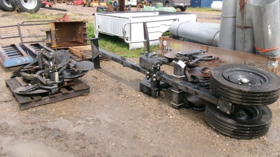 4 AIR SEEDER COULTERS & 2 SPRING LOADED COULTERS ON TRANSPORT (identity unknown ) &