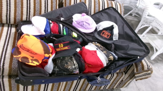 SUITCASE FULL OF CAPS