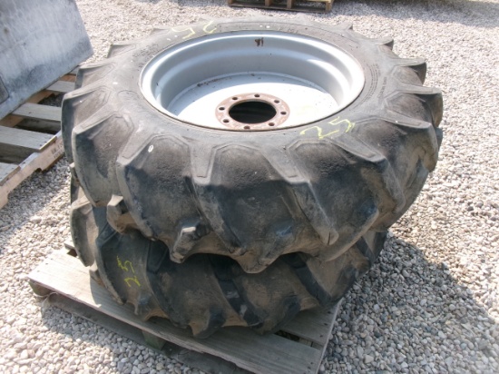2-12.4 X 24" TIRES ON 8 BOLT M.F. RIMS