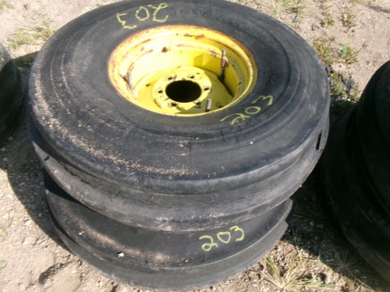 4-11.00 X 16" 6 BOLT RIBBED TIRES