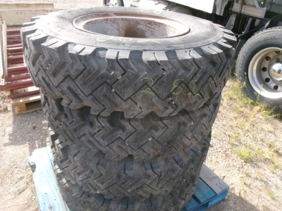 4-10.00 x 20" GRIP TIRES on Daytons rims (4 x your bid )