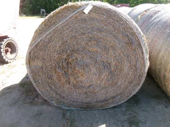 7-4' X 6' ROUND BALES of YEAR OLD NET WRAPPED OATS STRAW