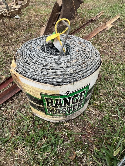 Roll of Barb Wire and T-Posts