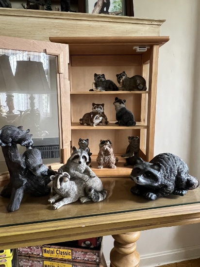 Display Cabinet and Raccoon Figurines