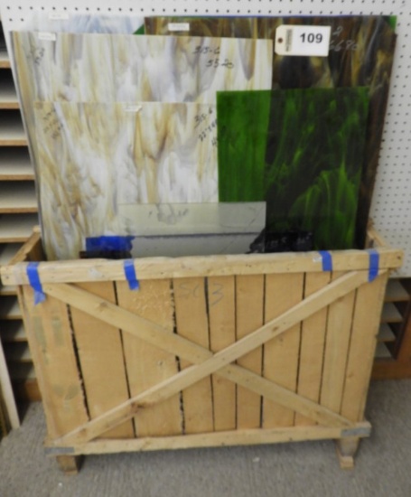 Wooden crate w/ stained glass sheets