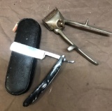 Old barber razor and hair clippers