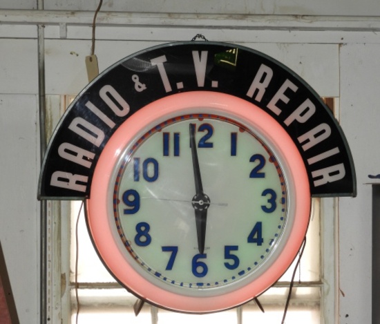 Cleveland double neon clock w/ advertising header