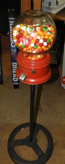 Ford 1 cent gumball coin-op machine on stand