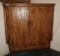 Corner cabinet w/ rustic finish, 31