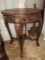 Carved wood accent table