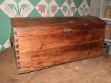 Curved top wooden hope chest, 12