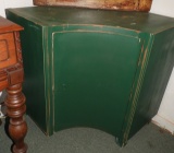 Green corner cabinet w/ curved door, 31