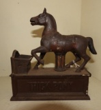 Reproduction cast iron Action coin bank