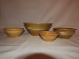 4 yellow ware bowls, 9 1/2
