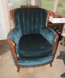 Exposed wood arm chair w/ carvings, 40