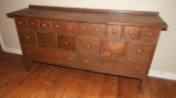 Apothecary style primitive cabinet w/ 18 drawers