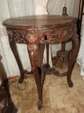 Carved wood accent table