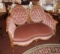 Loveseat, mauve upholstery, wood accents, excellen